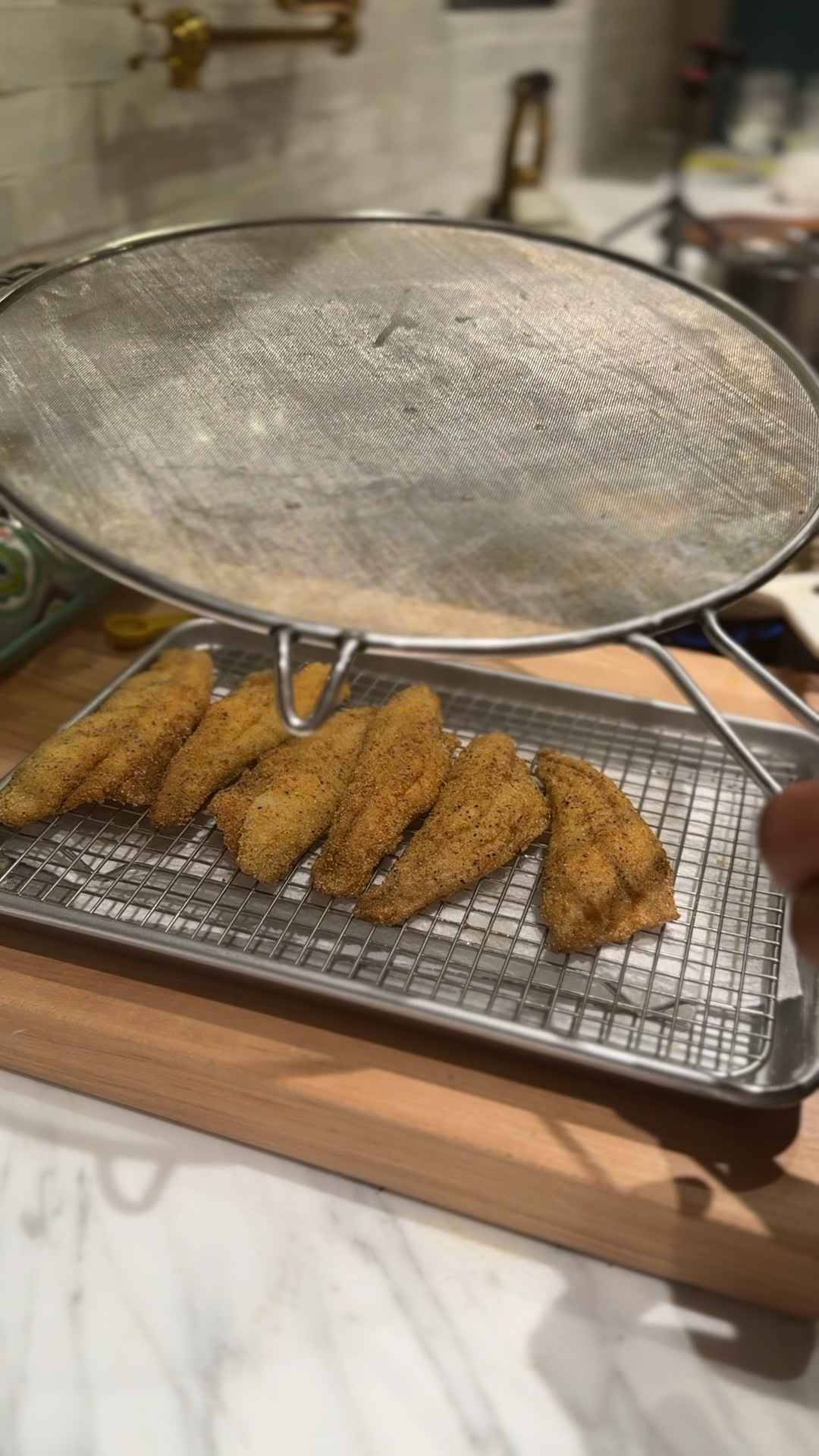 Cuisipro Splatter Guard
I’ve had mine for years, keeps the grease, splatter & messes at bay. 

#LTKhome