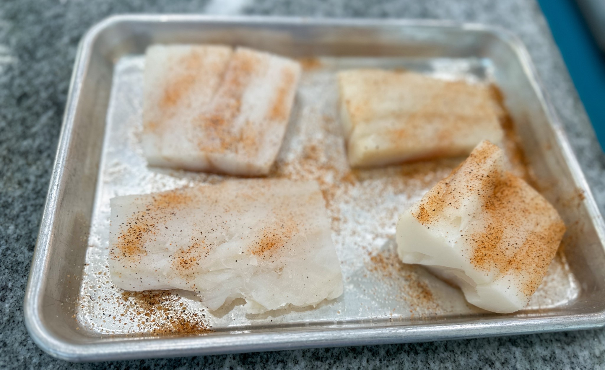 Seasoning my fish for my fish sandwich on these stainless steel pans. #pans #fish #seasoning #cajunified 

#LTKfoodie