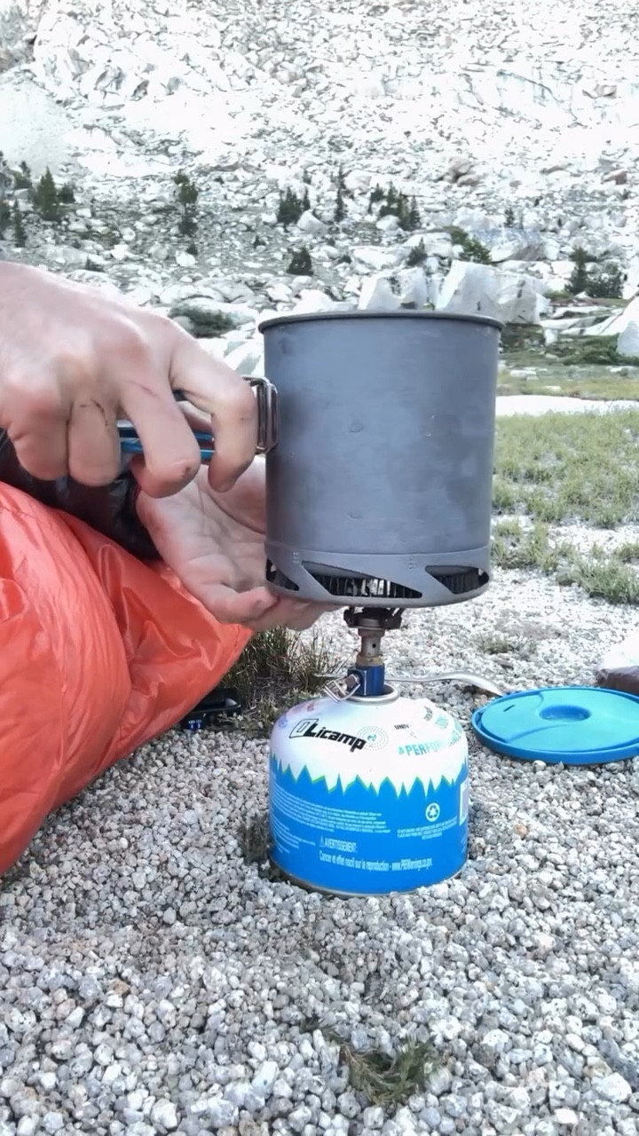 Our typical morning routine on trail: Tim makes coffee while Renee sleeps in. Whenever we add oat or coconut milk like this, we call it a trail cappuccino!

#coffee #backpacking #asmr #sierranevada #mountains