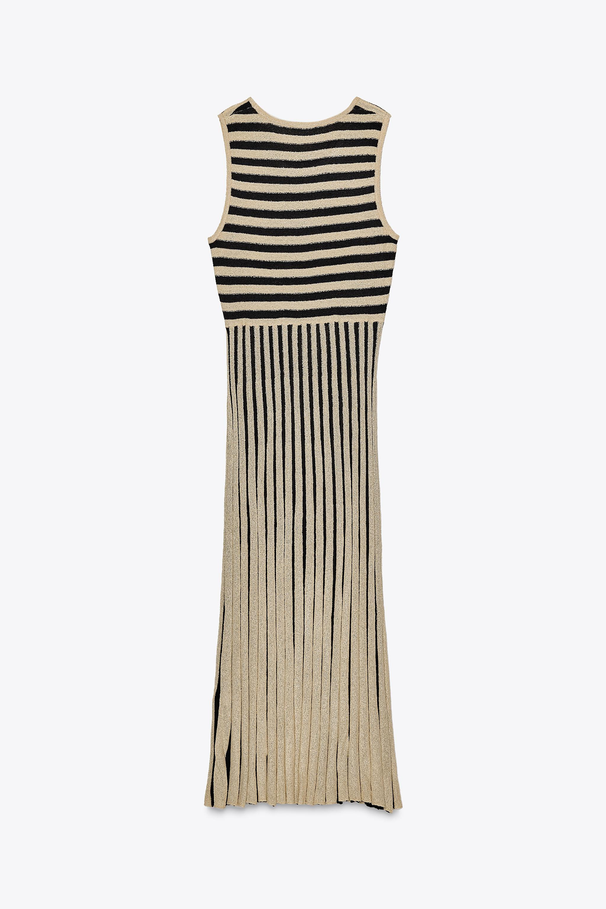 Knit midi dress. Round neck and sleeveless. Pleated hem. | Zara US