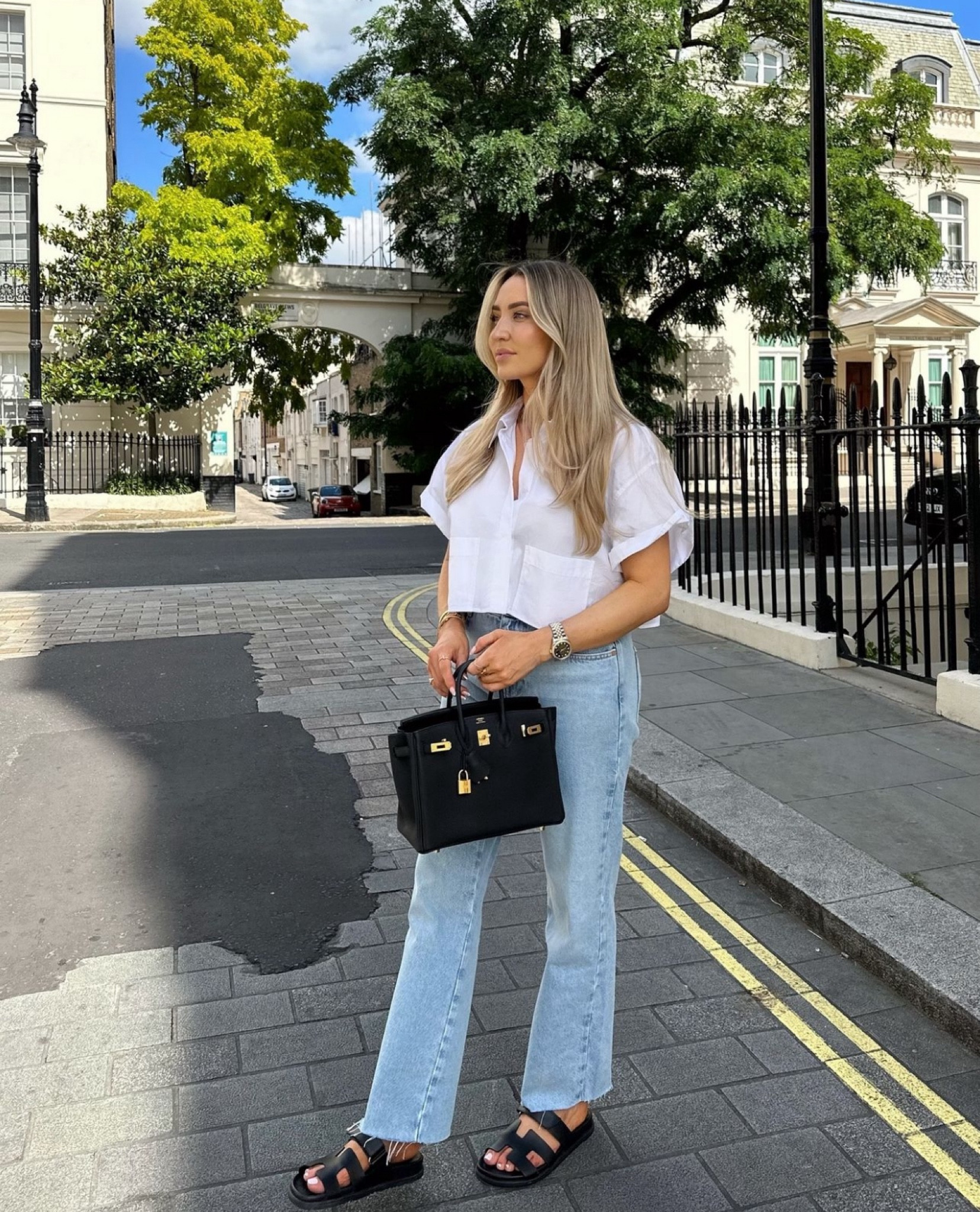 City Look 1 - tailored smart casual shirt and jeans combination, styling cropped white poplin shirt with baggy blue jeans, black Hermes accessories 🖤 

#LTKsummer #LTKautumn #LTKuk