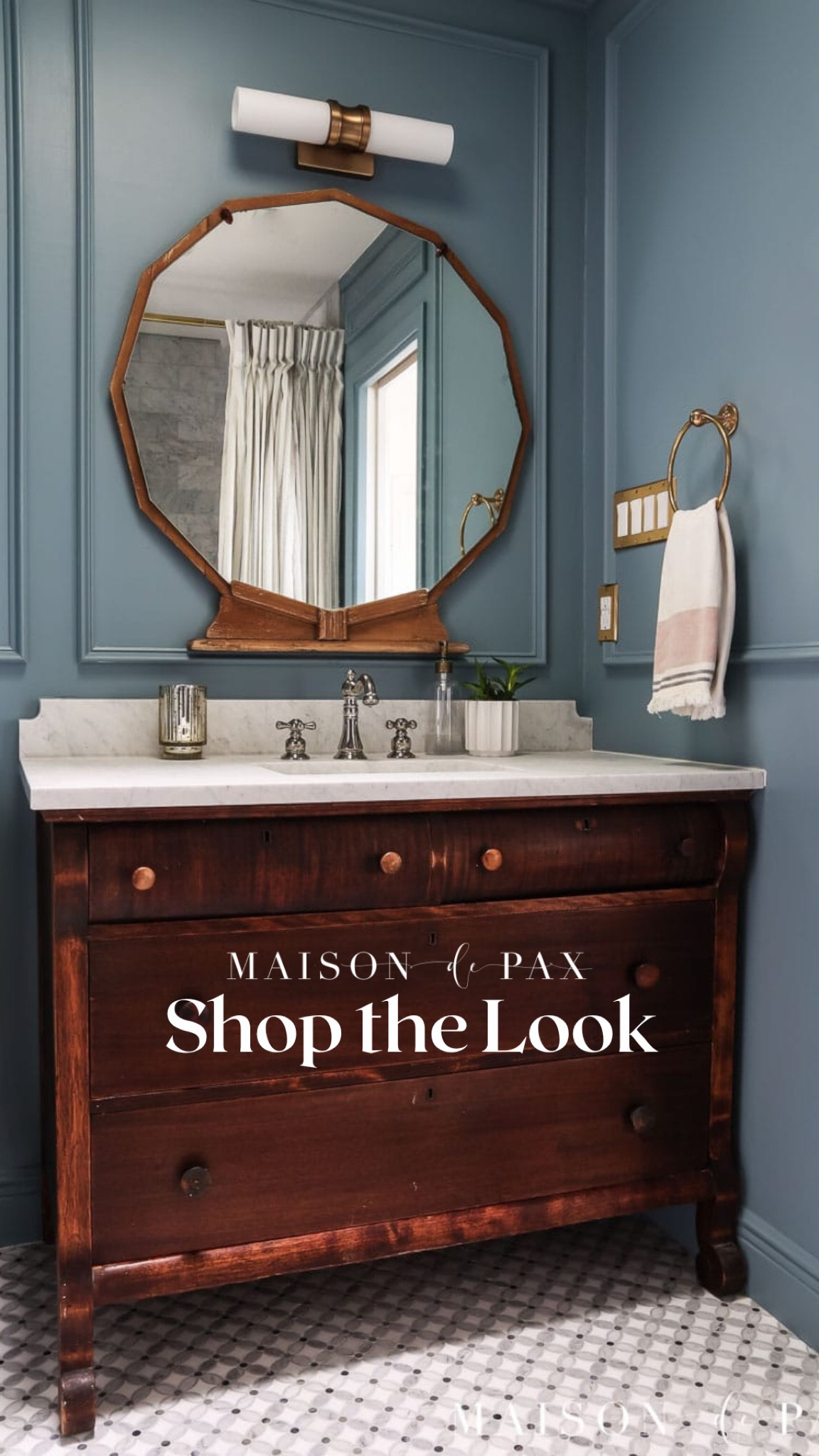 Looking to merge new with antique in creating a beautiful bathroom space? Antique dresser and mirror are paired with updated marble tile and fixtures  

#LTKfamily #LTKhome