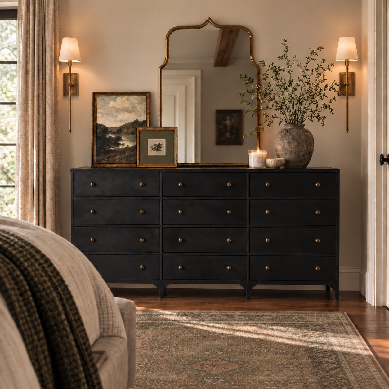 A dresser can take up a lot of visual space in a bedroom, so I like treating it almost like its own little moment rather than just finding a few things to fill the top.

For this one, I started with the oversized brass mirror and layered in artwork, greenery and a few smaller pieces so it feels collected without getting too busy. The warm brass, aged finishes and muted rug also help soften the black dresser and keep the contrast from feeling too stark.

This is a 3D rendering of my original dresser styling design so you can see how all of those pieces could actually come together in a room. Swipe to see the original design that inspired it.

I linked the exact pieces from the design here so you can recreate the look or pull a few ideas for your own bedroom.

#LTKHome