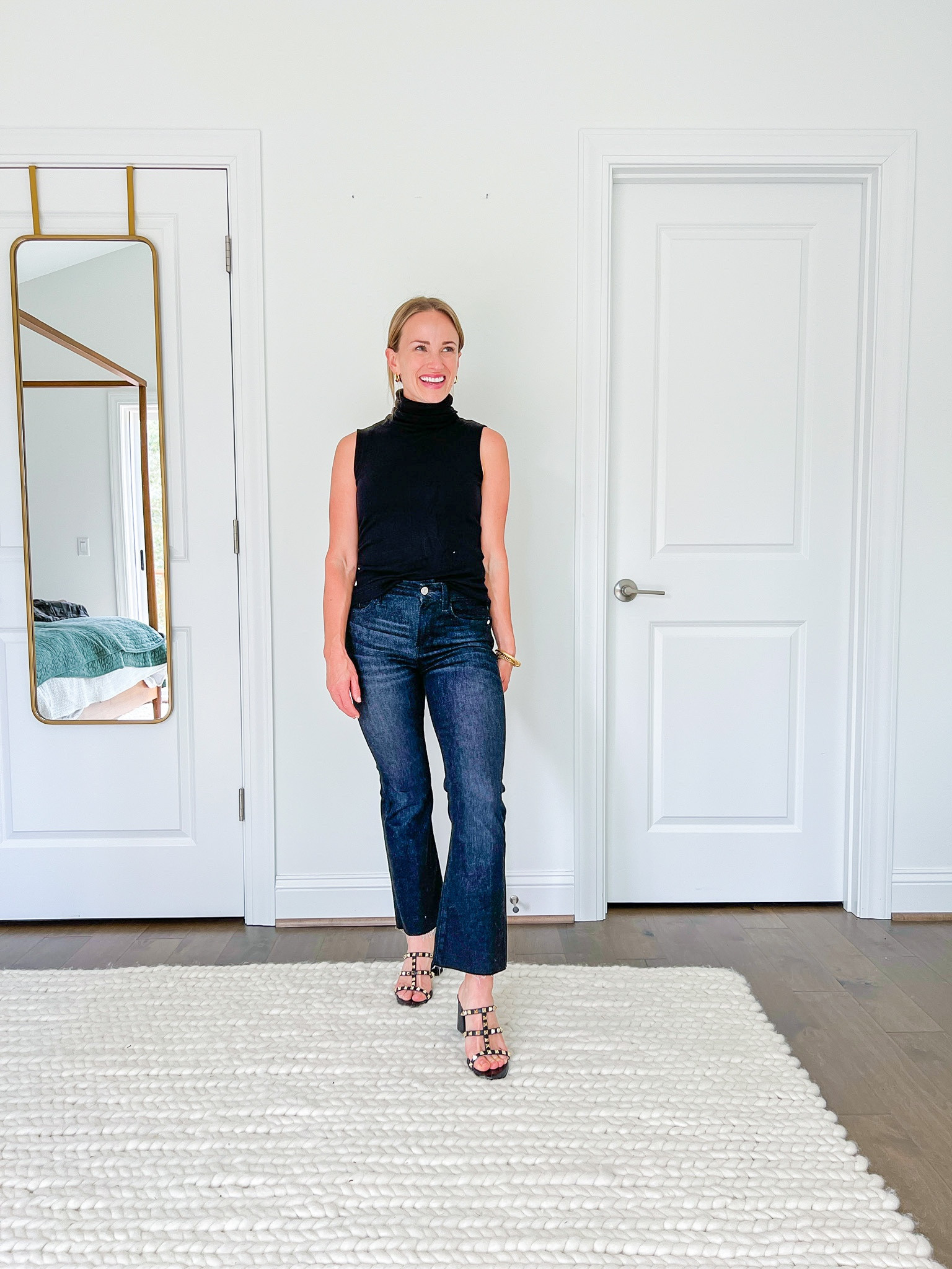 Totally in love with a sleeveless turtleneck sweater, paired with my favorite cropped black jeans and studded black heels. These heels from Tuckernuck are great dupes for the Valentino pair, and I love the studded detail for a dressier pop.

#LTKunder100#LTKshoecrush#LTKSeasonal