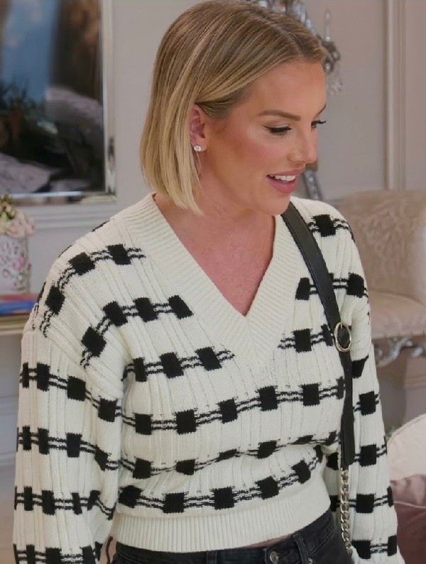 Whitney Rose on The Real Housewives of Salt Lake City on Bravo was spotted wearing this white black v-neck check sweater   ￼