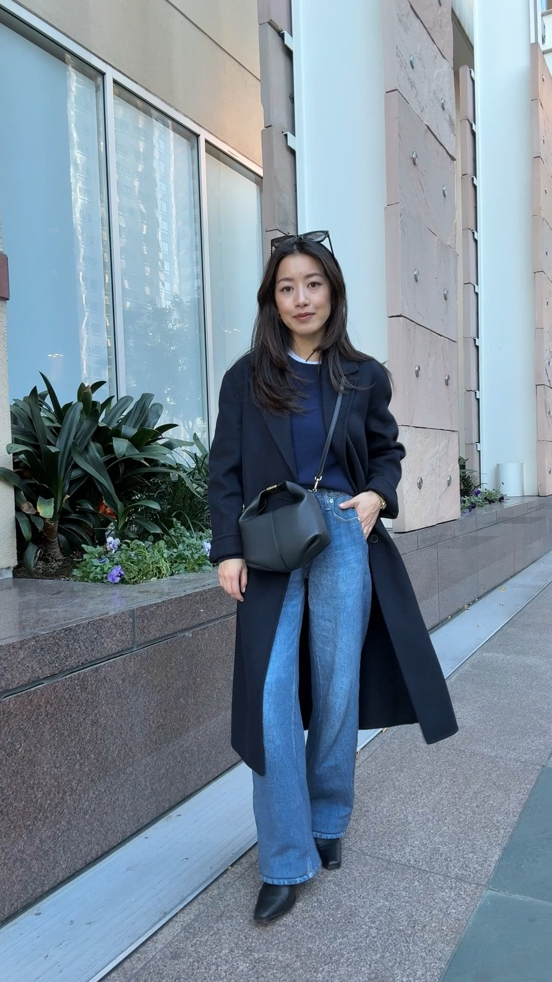 Travel ootd that is ready for the day

• Polene beri bag (not linkable)

• Rag & Bone Miramar wide leg pants in XXS with a fully stretch pull on waist. Petra wash. 

This style is tts, But for other Miramar styles linked with a button and zipper, I size down to 23.

• Aritzia double faced coat xxs - this lighter weight unlined style in double face wool.

• Quince Mongolian shrunken cashmere sweater xs, smaller and slightly shorter length than their standard

• Aritzia HomeStretch ribbed long sleeve tee I size up to XS and it’s still plenty fitted 

• Steve Madden Dusty bootie 5.5, TTS, very comfy, zero breaking in needed

Airport flight outfit, wool coat, sweatpant jeans, petite friendly, transitional spring style 

#LTKPetite #LTKTravel #LTKootd