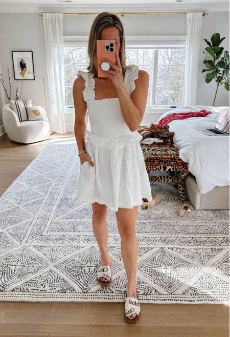 How cute is this Revolve flirty dress? I also have it in a tan/copper color. I’m wearing a small. I loved pairing it with these Bloomingdale’s Slide Sandals.

#LTKShoeCrush #LTKSeasonal #LTKStyleTip