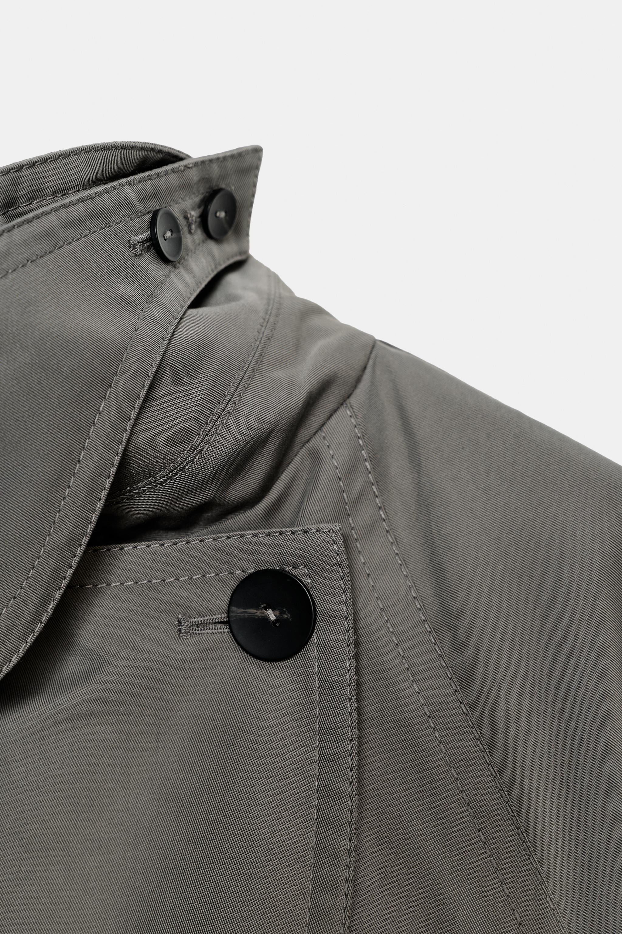 ZARA WOMAN COLLECTIONOversize trench coat made from a cotton blend yarn. Lapel collar and long sl... | Zara FR