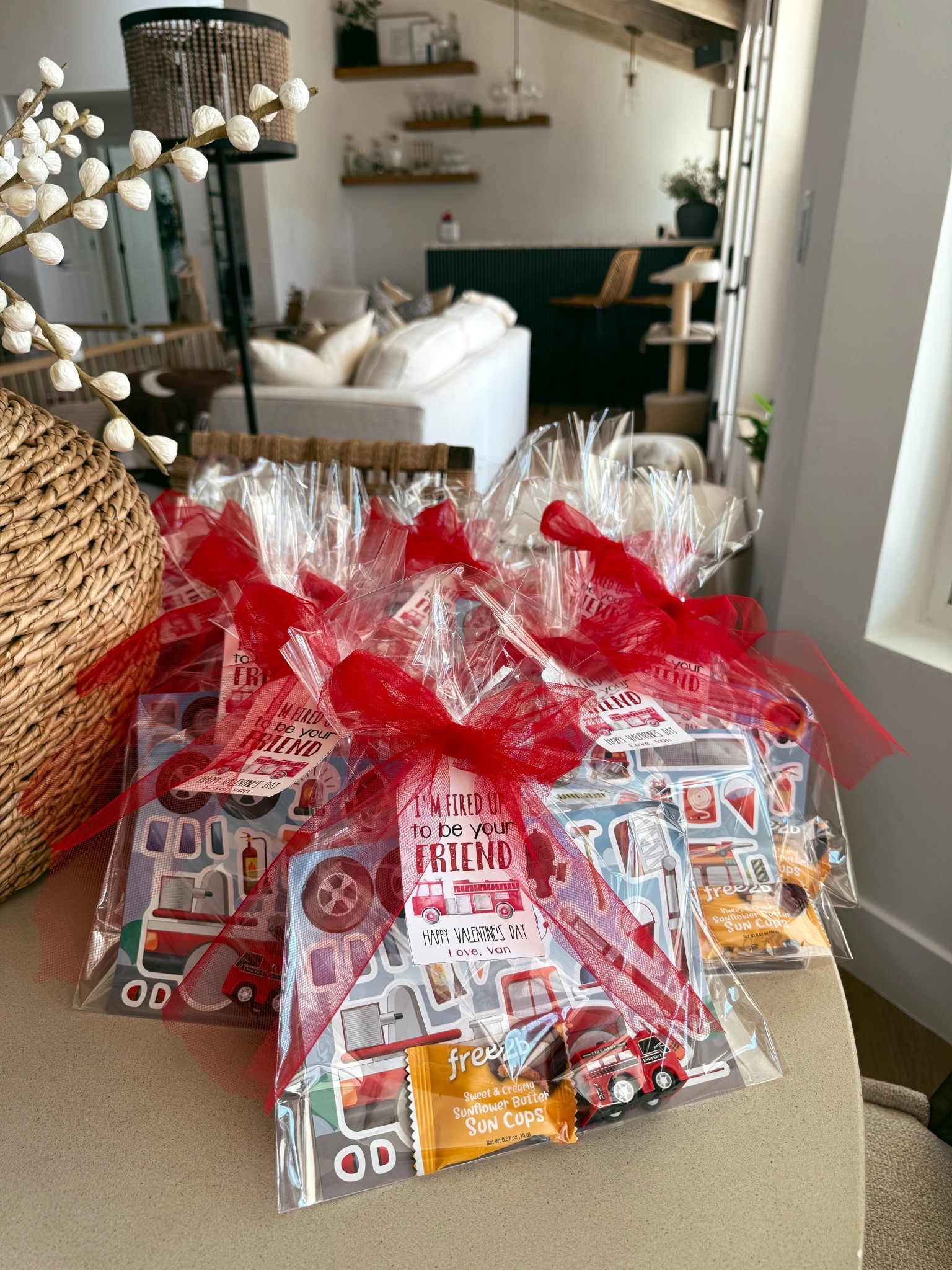 The cutest little preschool valentines! We decided on a fire truck theme and these Amazon fire truck sticker sheets and wind up cars were a must. We added them to a clear bag, added some sun butter candy cups, red tulle and a personalized gift tag from Etsy 

#LTKValentine #LTKKids #LTKmomlife