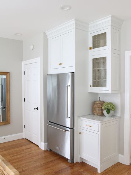 The refrigerator is counter depth to help keep a linear look. All of the cabinet hardware is from Rejuvenation in unlacquered brass. We use the basket set from Amazon as a bread basket 

#LTKFind #LTKstyletip #LTKhome