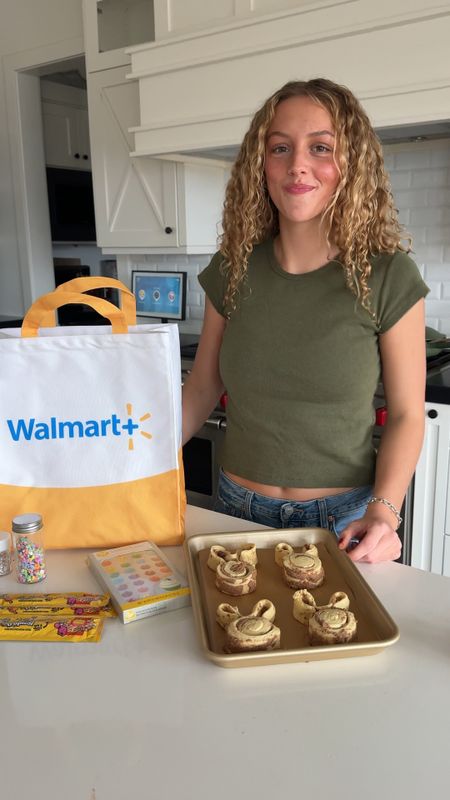 Emery made the CUTEST Easter cinnamon rolls this week and they turned out so good. I couldn’t believe how easy it was too. Get everything delivered right to your door with #WalmartPlus. Pop open the can of cinnamon rolls and unroll it a bit to form the ears, bake, then add frosting and cute decorations! #WalmartPartner @walmart