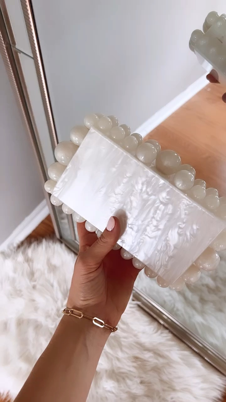 Cult Gaia look for less! On sale for under $50! Makes for the perfect evening clutch . 

#LTKwedding #LTKunder50 #LTKstyletip