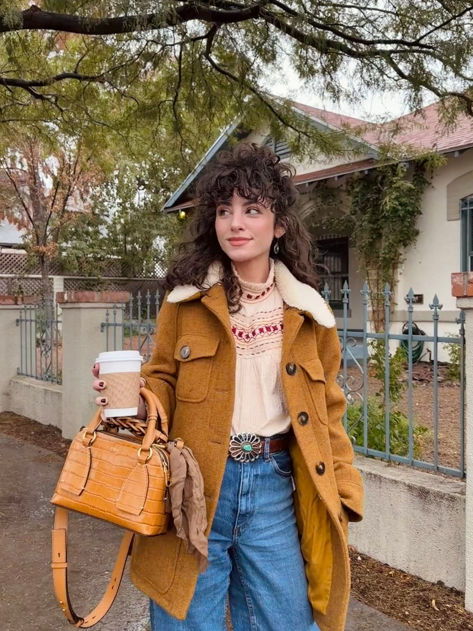 Western boho outfit details. The embroidery on this blouse is gorgeous. Love the higher neck for winter too! Add a statement belt and you’re good to go  

#LTKSeasonal