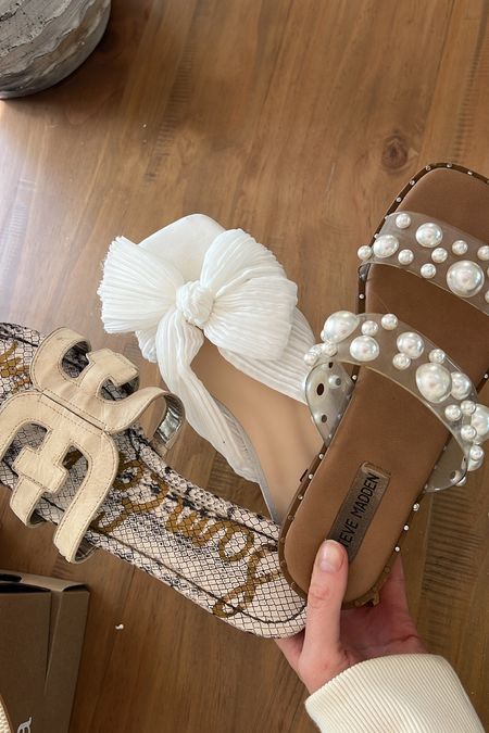 Linking similar versions of the pearl sandals as they are sold out but the Sam eldman (right) come in white just without the snakeskin! 