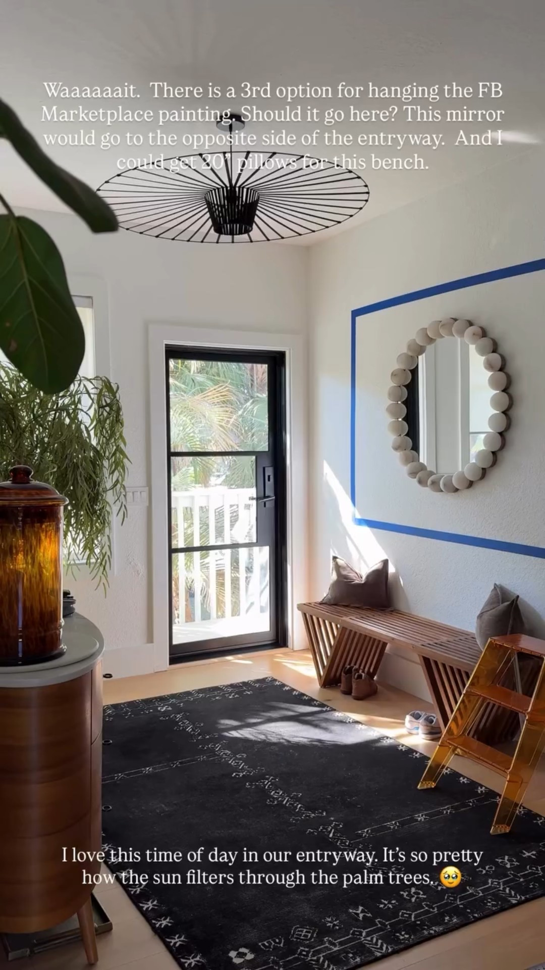 Waaaaaait.  There is a 3rd option for hanging the FB Marketplace painting. Should it go here? This mirror would go to the opposite side of the entryway.  And I could get 20” pillows for this bench.  I love this time of day in our entryway. It’s so pretty how the sun filters through the palm trees. 🥹