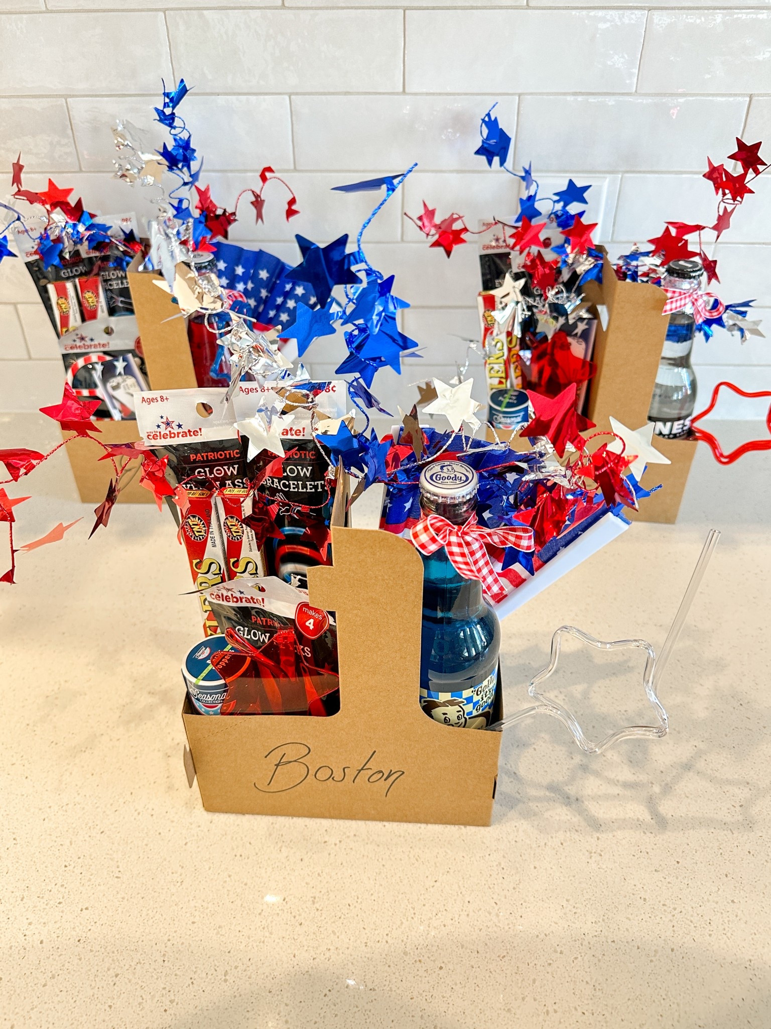 I’m so excited to be putting together the cutest 4th of July gift boxes for my kids. These fun boxes are packed with everything they need to celebrate in style and make magical memories. Inside each one, I included:
	•	Sparklers to light up the night
	•	Glow sticks and patriotic sunglasses for after-dark fun
	•	Red, white & blue soda as a special treat
	•	USA-themed hair accessories for my daughter
	•	Confetti poppers to start the celebration
	•	3D fireworks glasses for an unforgettable view of the fireworks show
These boxes are perfect for your 4th of July celebration, a kids’ parade, or just to bring a little extra fun to your family’s fireworks night.

patriotic gift ideas, Independence Day fun, family celebration essentials, kids 4th of July box, July 4th kids activities, fun summer ideas, red white and blue gifts, parade day must-haves, kids party boxes, festive family moments

#LTKSeasonal #LTKSummerEdit #LTKFamily