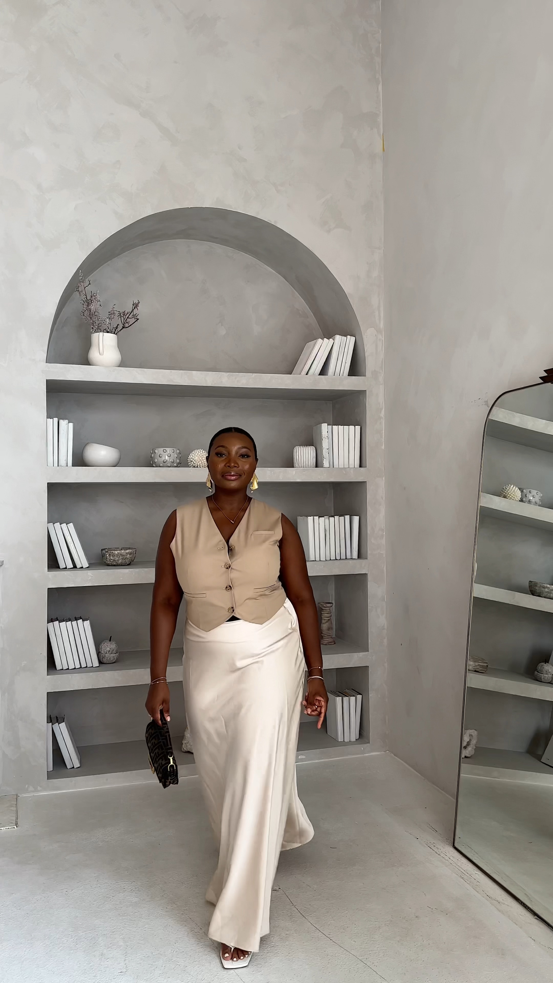 Summer Outfit Ideas - Button Down Vest with Beige Maxi Skirt. This can be dressed down or up depending on the occasion 🫶🏾

#LTKunder100 #LTKworkwear #LTKstyletip