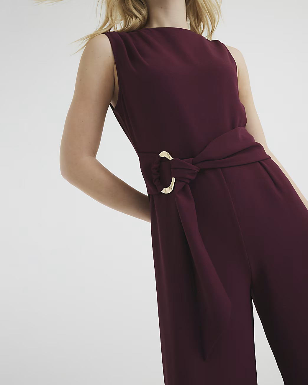 Red Sleeveless Belted Jumpsuit | River Island UK & IE
