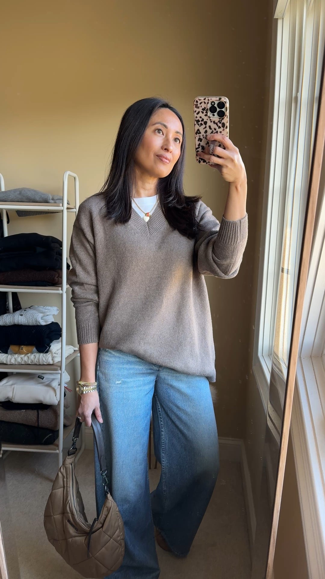 3 ways to wear: v-neck sweater. 
1) casual chic on its own tucked with belt and booties
2) layered casually with a t-shirt and comfy jeans with sneakers 
3) layered dressy with a button-down shirt and flare leg pants with booties

-Exact sweater is soft, cashmere alternative and feels cozy like a lightweight sweatshirt. True to size. 
Linking other alternatives too. 
- Barrel jeans
-Sweatpant jeans
-Flare leg jeans 
-Kitten heel booties
-Suede sneakers 


#LTKOver40 #LTKSaleAlert #LTKootd