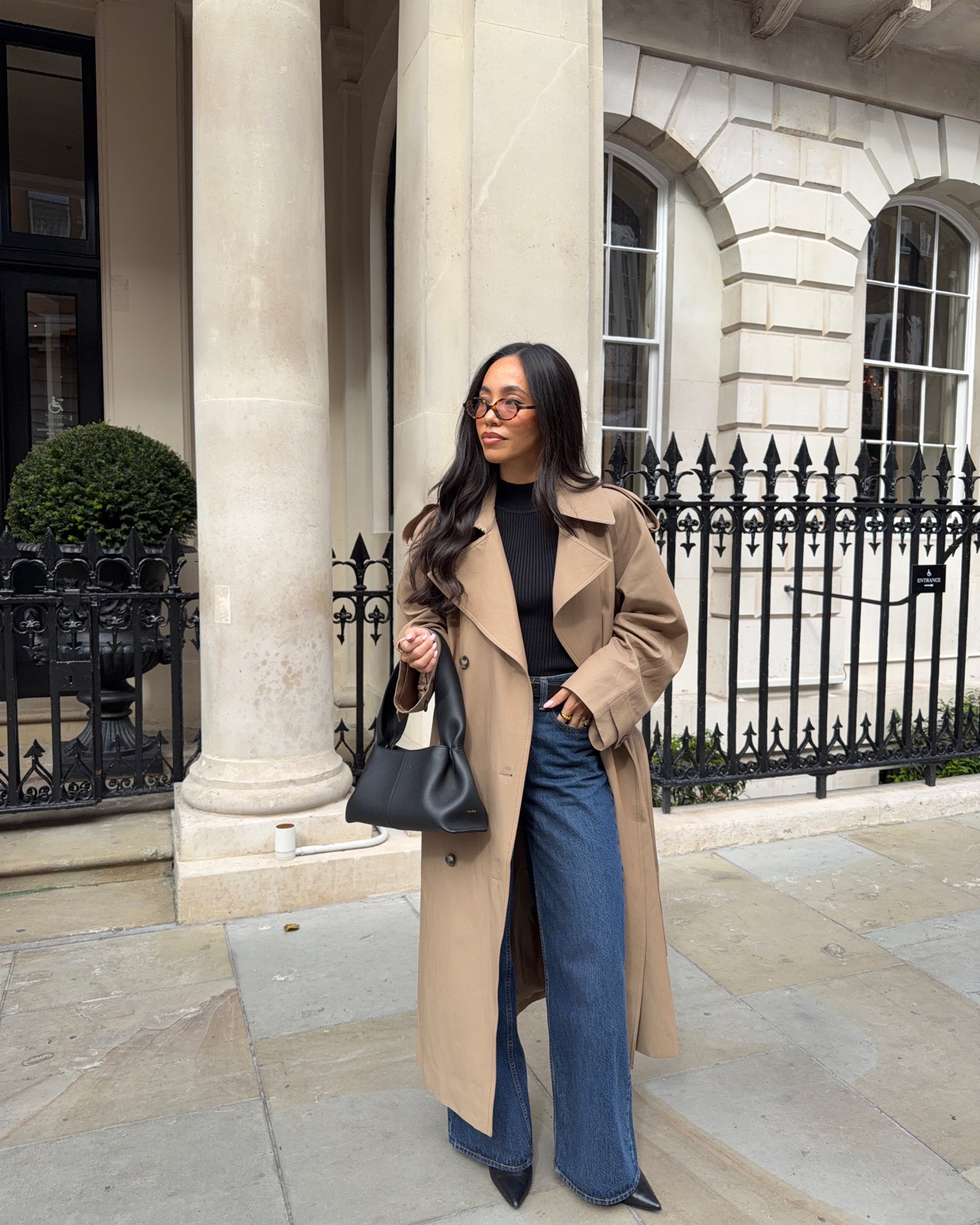 Transitional autumn OOTD 🍂 trench coat, black knit vest and blue wide jeans

#LTKautumn #LTKjeans