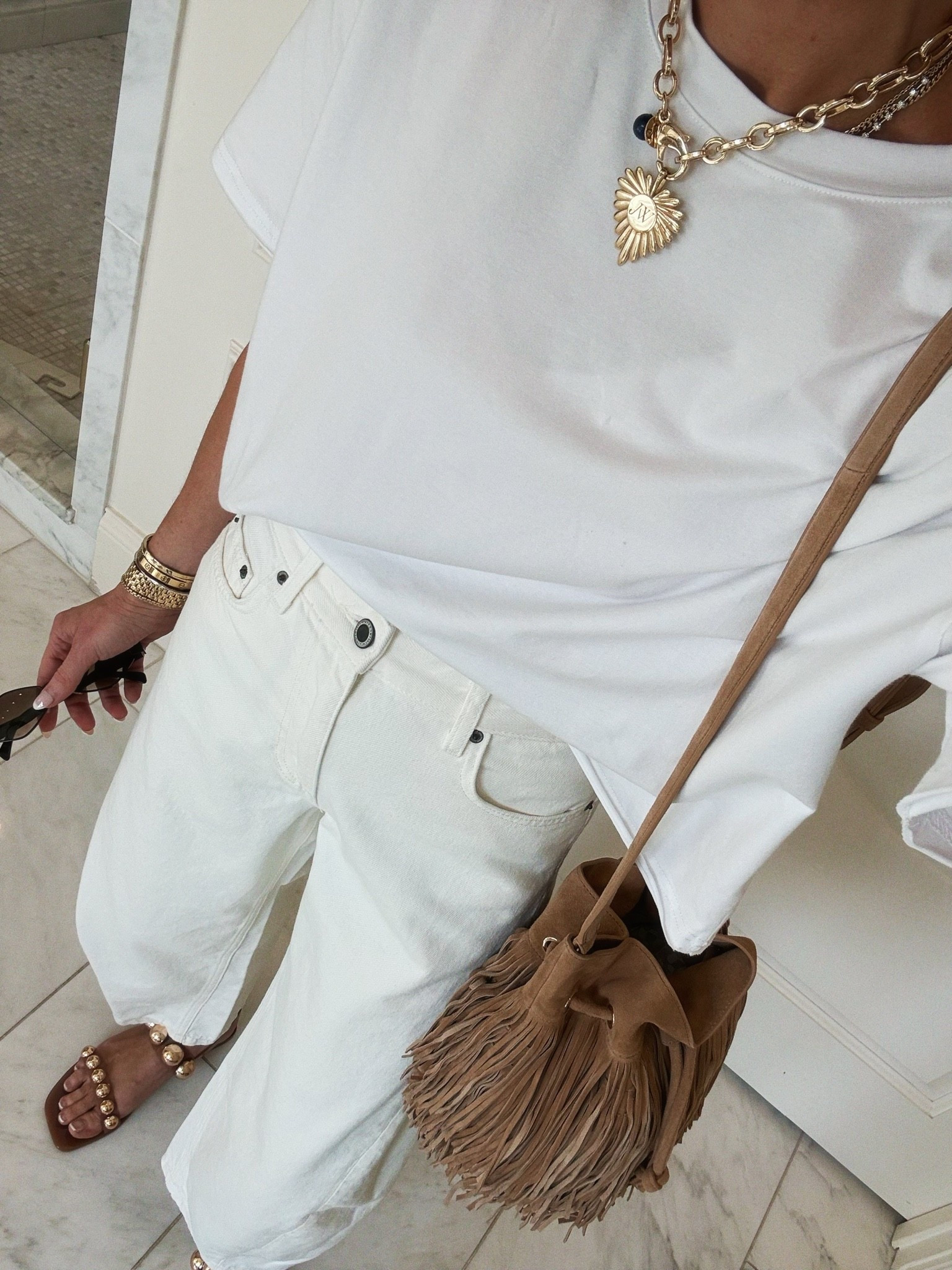 Outfit of the day is white on white with some cute brown accessories! My shirt is 23% off on Amazon and my balloon jeans are under $80 🤍

#LTKootd #LTKSeasonal
