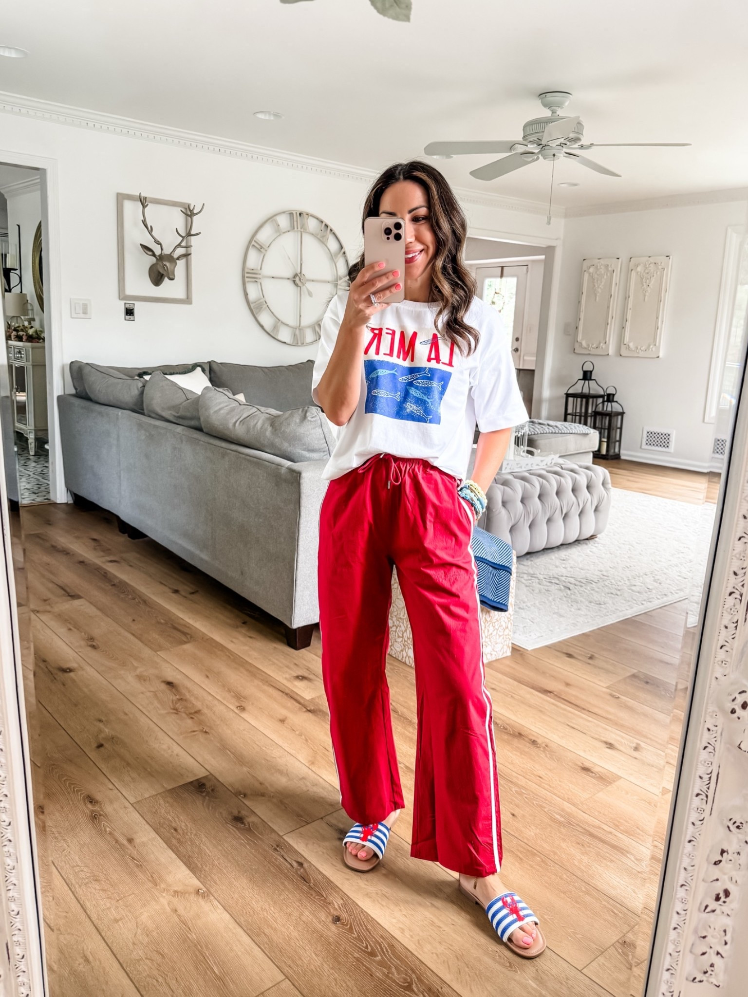 Xs graphic Tee. XS red track pants. Sandals TTS.

#LTKOver40 #LTKSaleAlert #LTKPetite