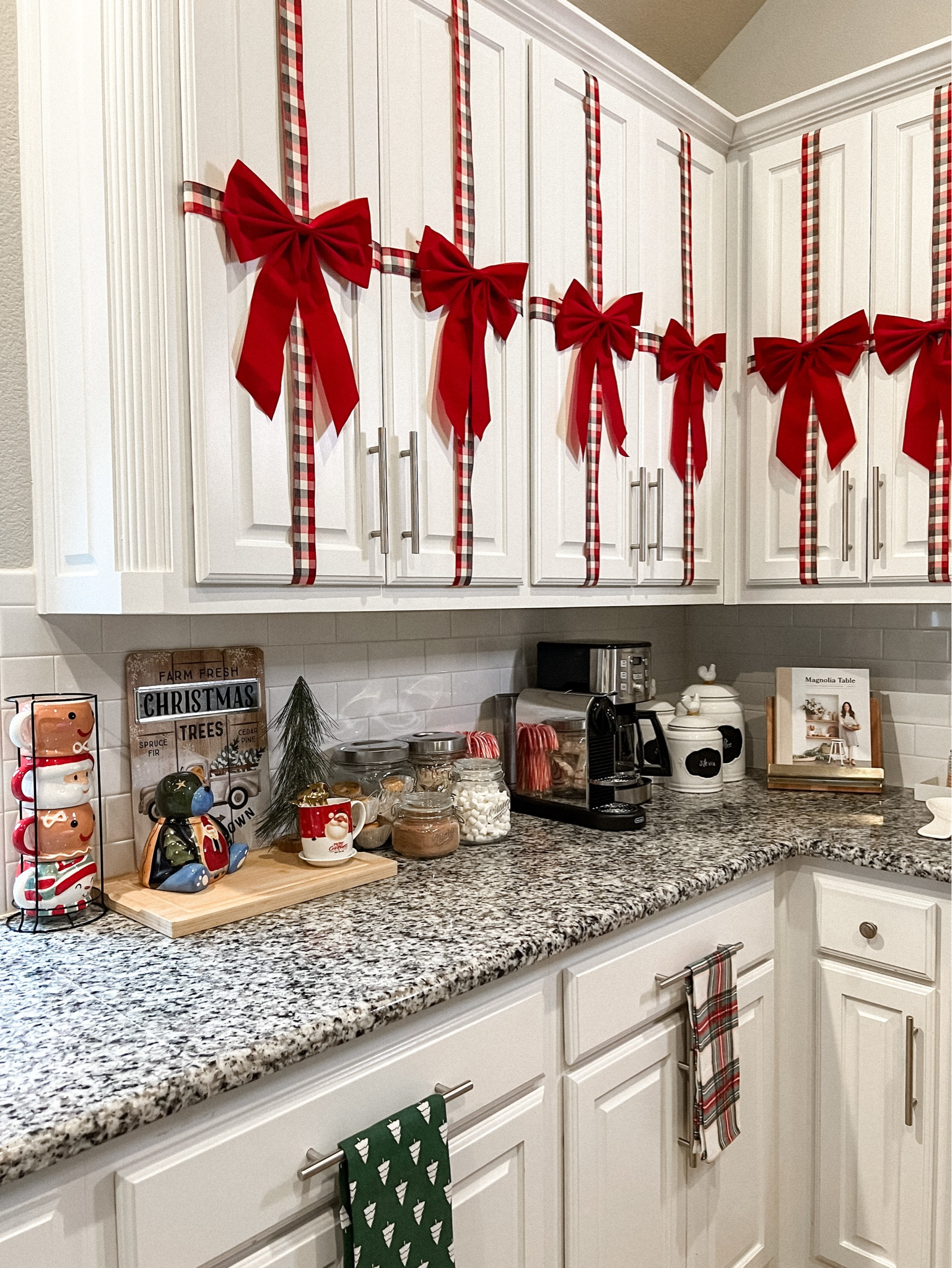Christmas Decor
Kitchen Christmas 
Bow cabinets
Red bows
Hot chocolate station 
Hot cocoa bar 
Traditional Christmas 

#LTKSeasonal #LTKHoliday #LTKHome