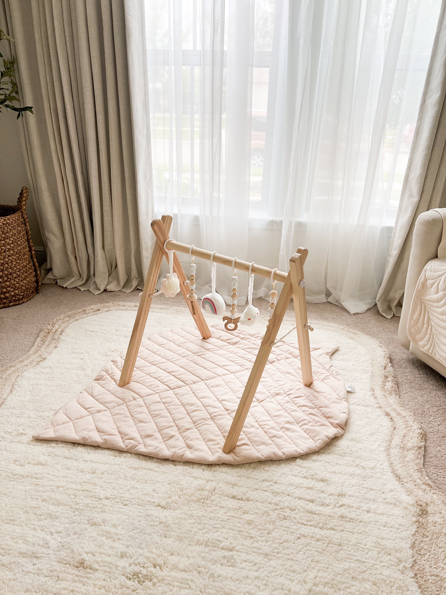 Baby girl nursery decor ideas! Love this baby wooden play gym and organic play mat. #babygirlnursery #babynursery 

#LTKBaby #LTKKids #LTKHome