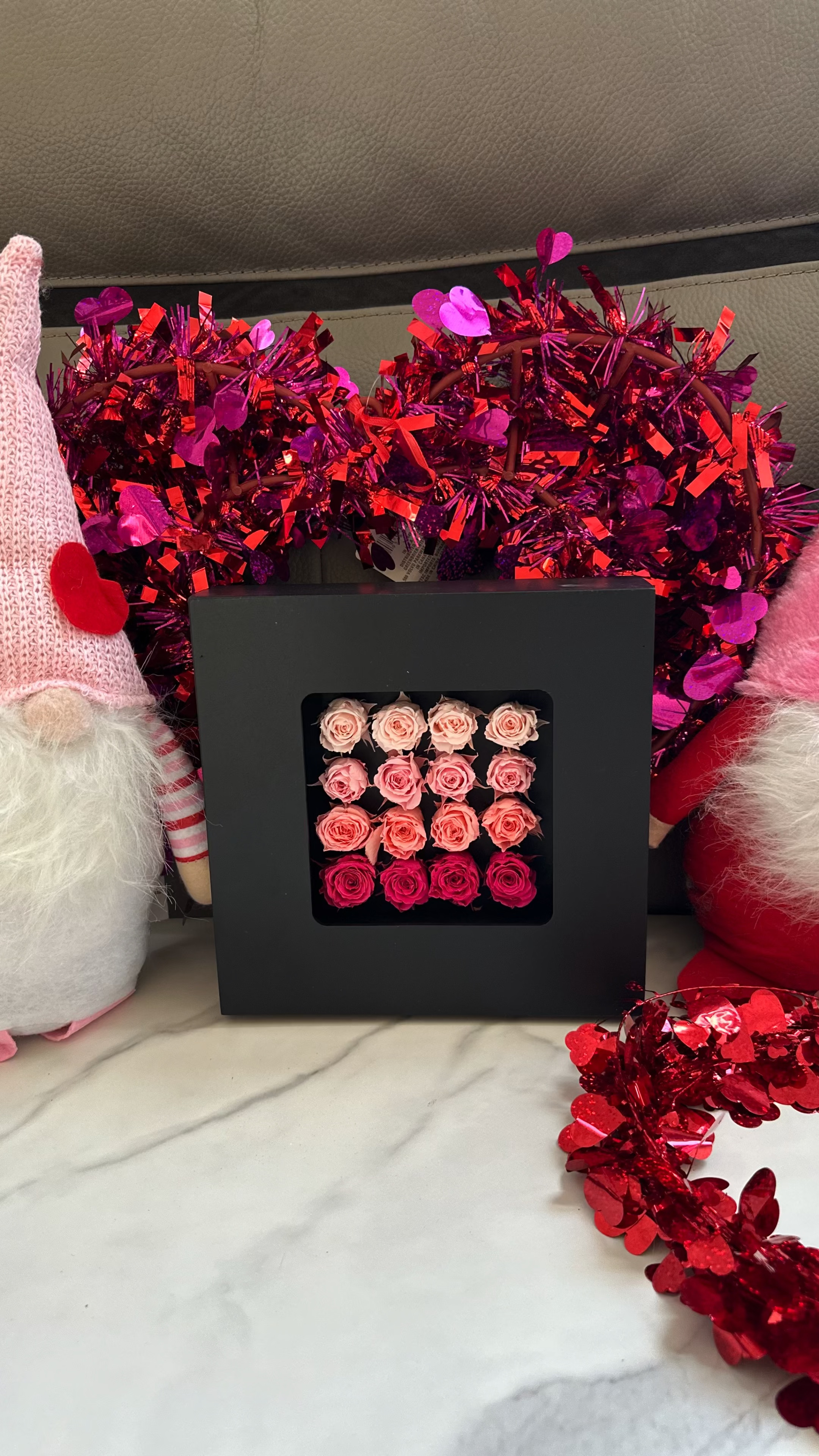 As the woman hung our 16 preserved roses on the wall, she couldn't help but feel a sense of joy and admiration for their beauty. The arrangement, with its variety of colors, added a touch of elegance to her living room. The roses seemed to be frozen in time, as if they had just been picked from our farms to make the arrangement. No need to worry about their upkeep, as these preserved roses required little maintenance and could last for years.

#LTKGiftGuide #LTKVideo