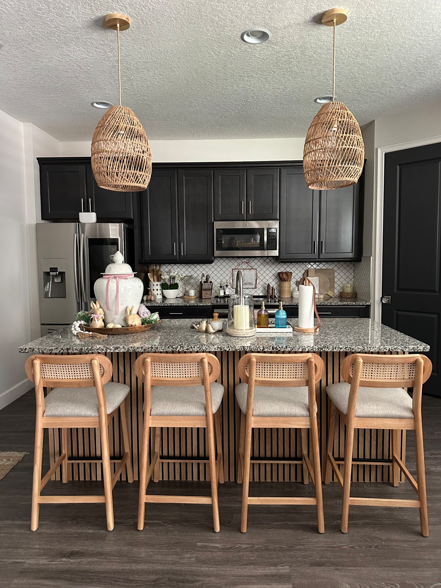 Love how the kitchen is coming along excited for our new faucet #kitchen #kitchenlighting #rattanpendantlight #canecounterheightstools #stools #kitchenisland #bohemiandesign #scandi 

#LTKHome #LTKSeasonal #LTKStyleTip
