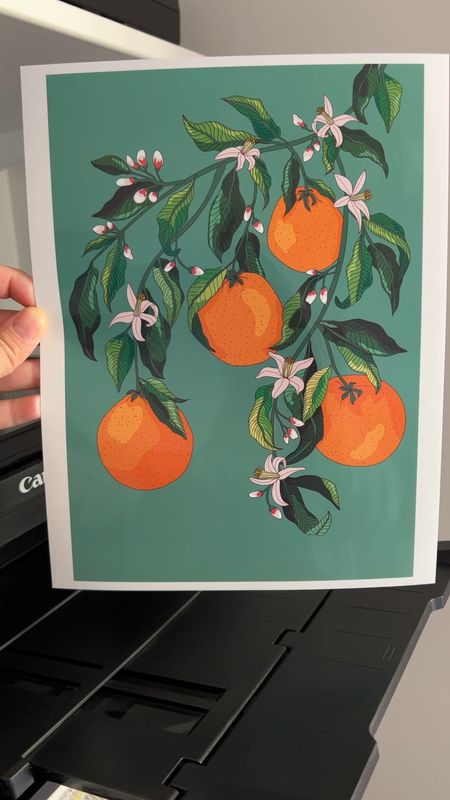 In love with this colorful orange blossom digital print that I printed at home 😍😍😍 I also linked the adorable scallop wicker frame I am putting it in,  my printer and the photo paper I use. Digital art, orange blossom art, colorful art, scallop frame, scallop decor, wicker frame

#LTKFind #LTKunder50 #LTKSeasonal