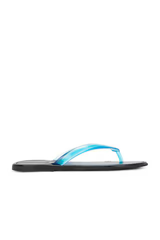 The Row Beach Flip Flop in Transparent Blue | FWRD | FWRD 