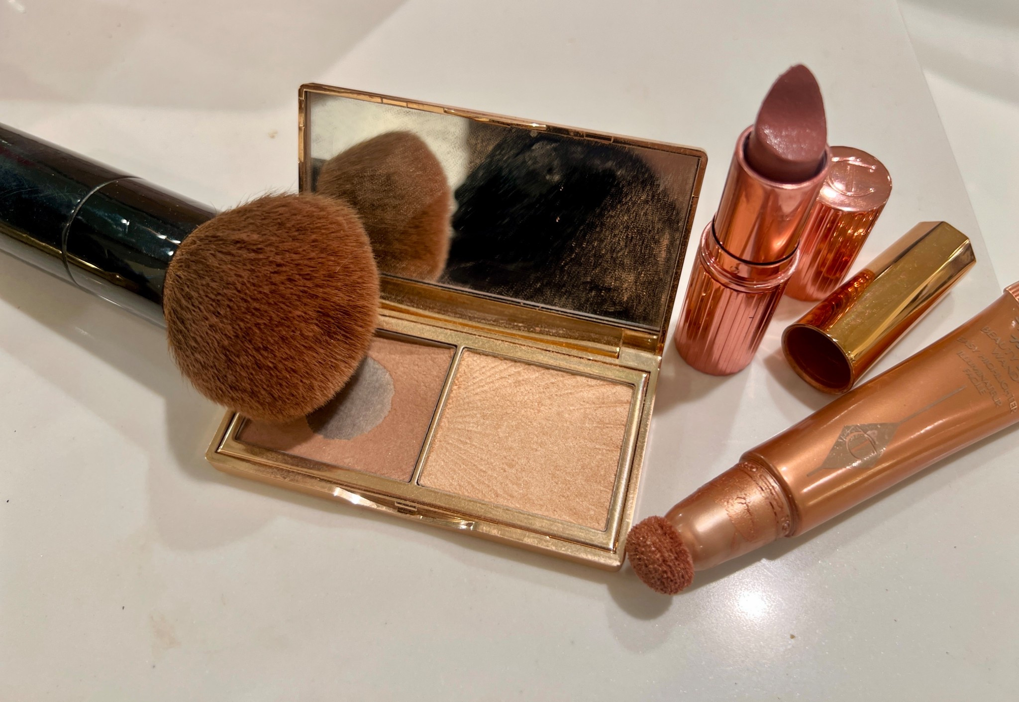 My favorite combo .. 
the film star bronze & glow which I often use as a blush and highlight right above it… 
The pillow talk beauty light wand in medium color. 
Tip: I put one dot on the bottom of my cheekbone and blend it to create the perfect contour! 
Gives me amazing cheekbones!
And my favorite lipstick… Icon baby glides onto your lips and gives a nice moisturizing glow of a perfect neutral color that you can make darker via lip liners-the best! 
#charlottetillbury #makeup #lipstick #highlighter #cheekbones #glam #cosmetics 


#LTKStyleTip #LTKTravel #LTKBeauty