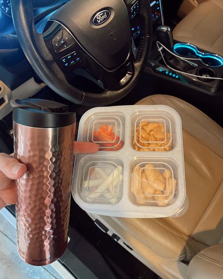 Our favorite snack carrier! #kidssnacks #kidsfinds #ltkkids #snacks #travel #carsnacks 