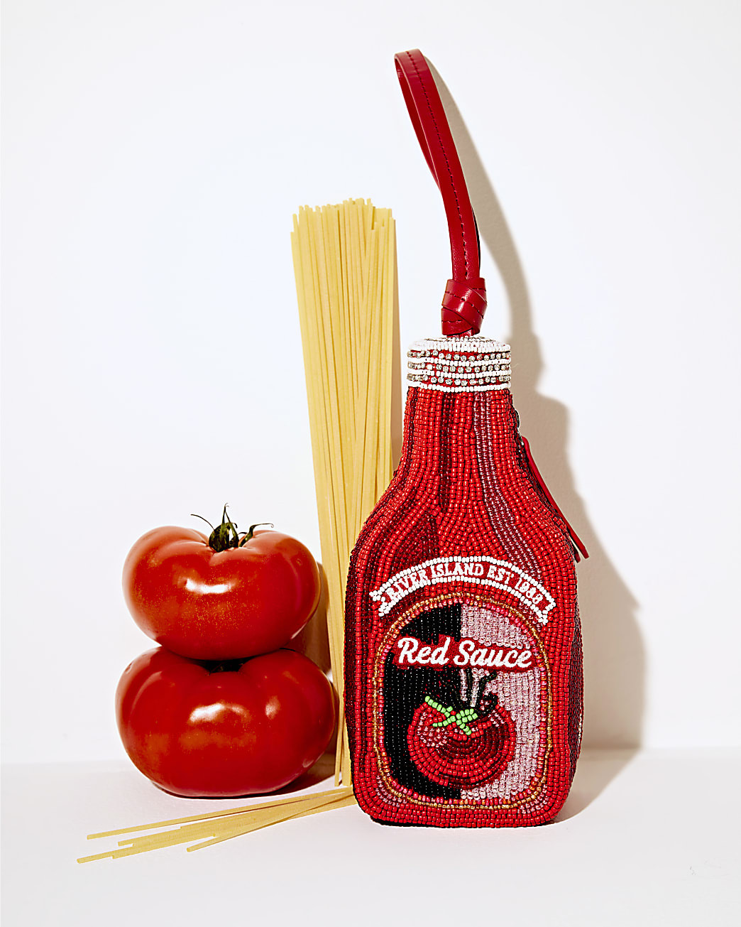 Red Premium Red Sauce Beaded Clutch Bag | River Island UK & IE