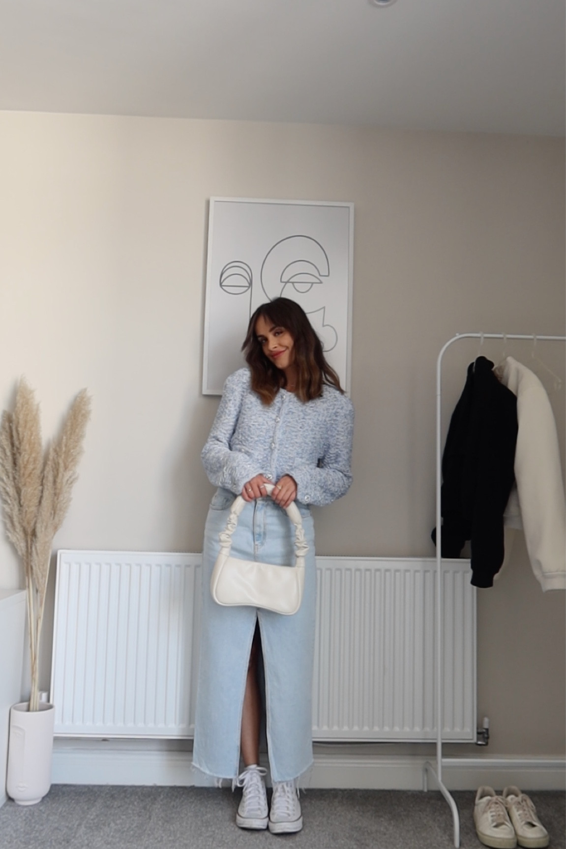 Blue cropped long sleeve jacket, light denim maxi slit skirt, white trainers converse, white shoulder bag

#LTKSeasonal #LTKeurope #LTKstyletip