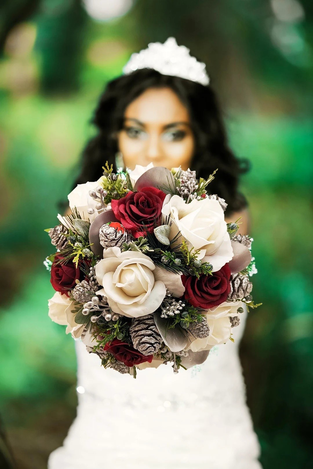 Make your winter wedding unforgettable with this stunning Real Touch rose bouquet from SongsFromTheGarden. Featuring a luxurious blend of white and burgundy roses, evergreen accents, juniper, seeded eucalyptus, silver berries, and pine cones, it captures the beauty of the season in an elegant, lasting design. With multiple size options and customizable ribbon colors, you can tailor each bouquet to perfectly suit your bridal party—from petite flower girl arrangements to full bridal sizes. A gorgeous choice for creating a cohesive, wintry look across your celebration. ❄️💍✨
#LTKwedding #winterwedding #bridalbouquet #silkflowers #realtouchroses #weddingflorals #etyswedding #burgundywedding #evergreendecor

#LTKHome #LTKHoliday #LTKWedding