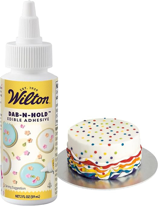 Wilton Dab-N-Hold Edible Adhesive, Food-Safe Glue, 2 oz. | Food-Safe Edible Glue for Attaching Fo... | Amazon (US)