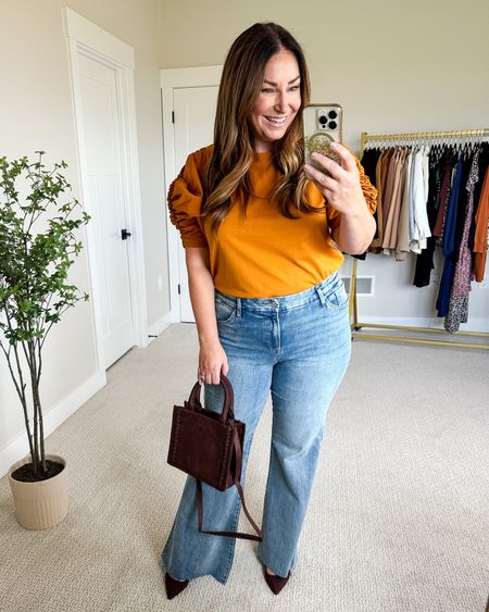 Flare jeans from @express 

Fit tip: top tts, L // jeans L Regular but cut about 1” in length 

#expresspartner 

Bright blouse  blue jeans  brown bag  casual outfit  classy casual  casual  nice fit  fall outfit  fall style  fall casual style 

#LTKSeasonal #LTKFind #LTKstyletip