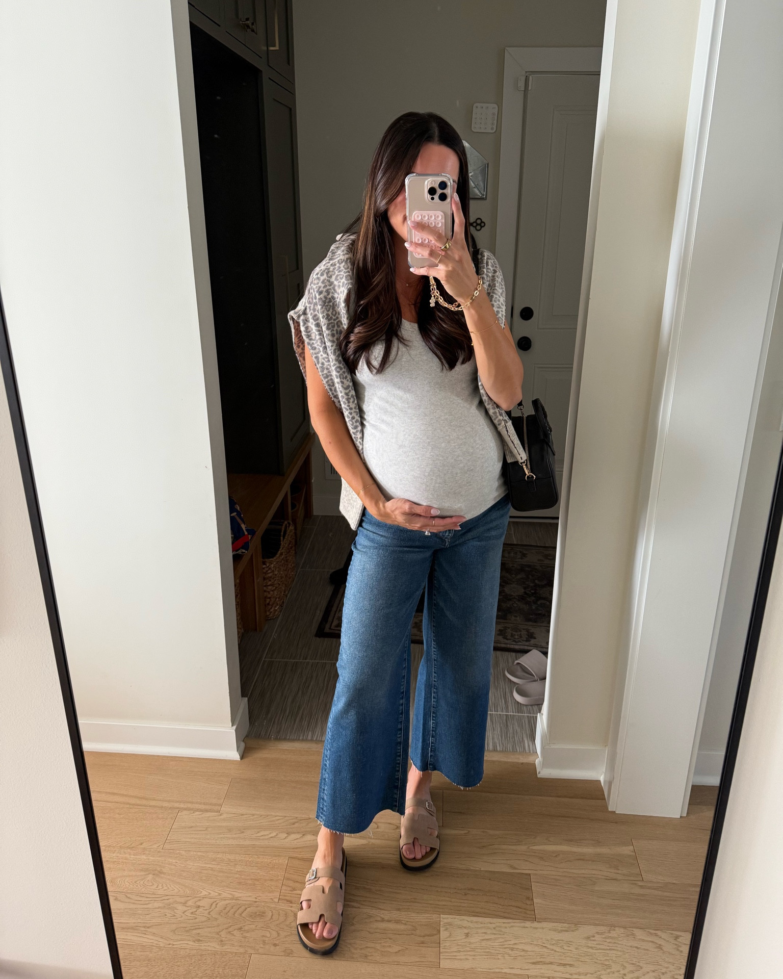 Casual early fall outfit 🐆🩶

Leopard cardigan: sized up to a M for a less fitted fit 
Maternity tank: sized down (XS) 
Maternity jeans: true to pre-pregnancy size (26) size up if between
Sandals: true to size

#LTKSeasonal #LTKShoeCrush #LTKBump