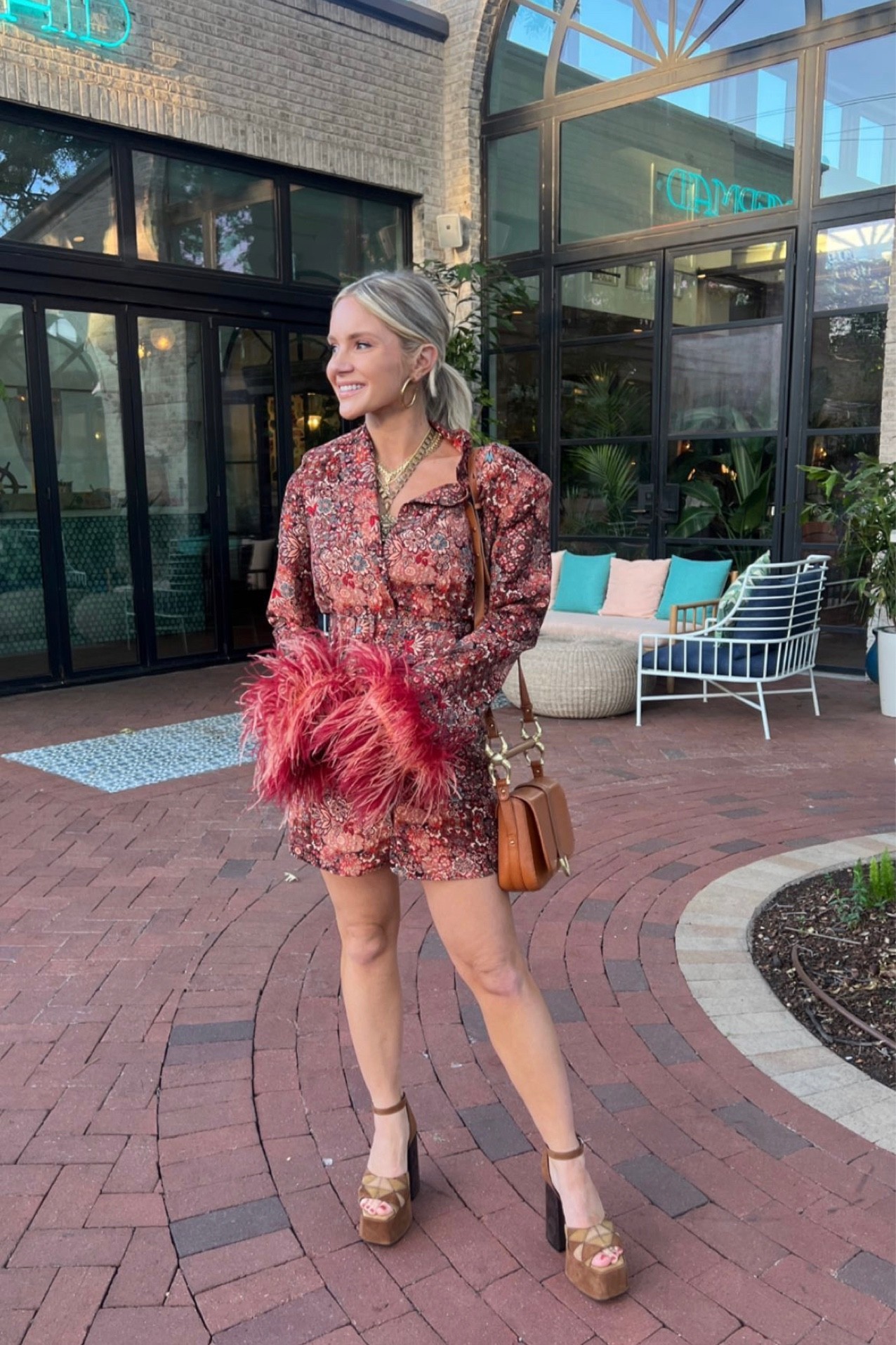 Perfectly printed in a blazer-inspired silhouette, this forever cool mini dress features a belted center and defined shoulders with contrast fur trim at sleeve cuffs for an added special touch