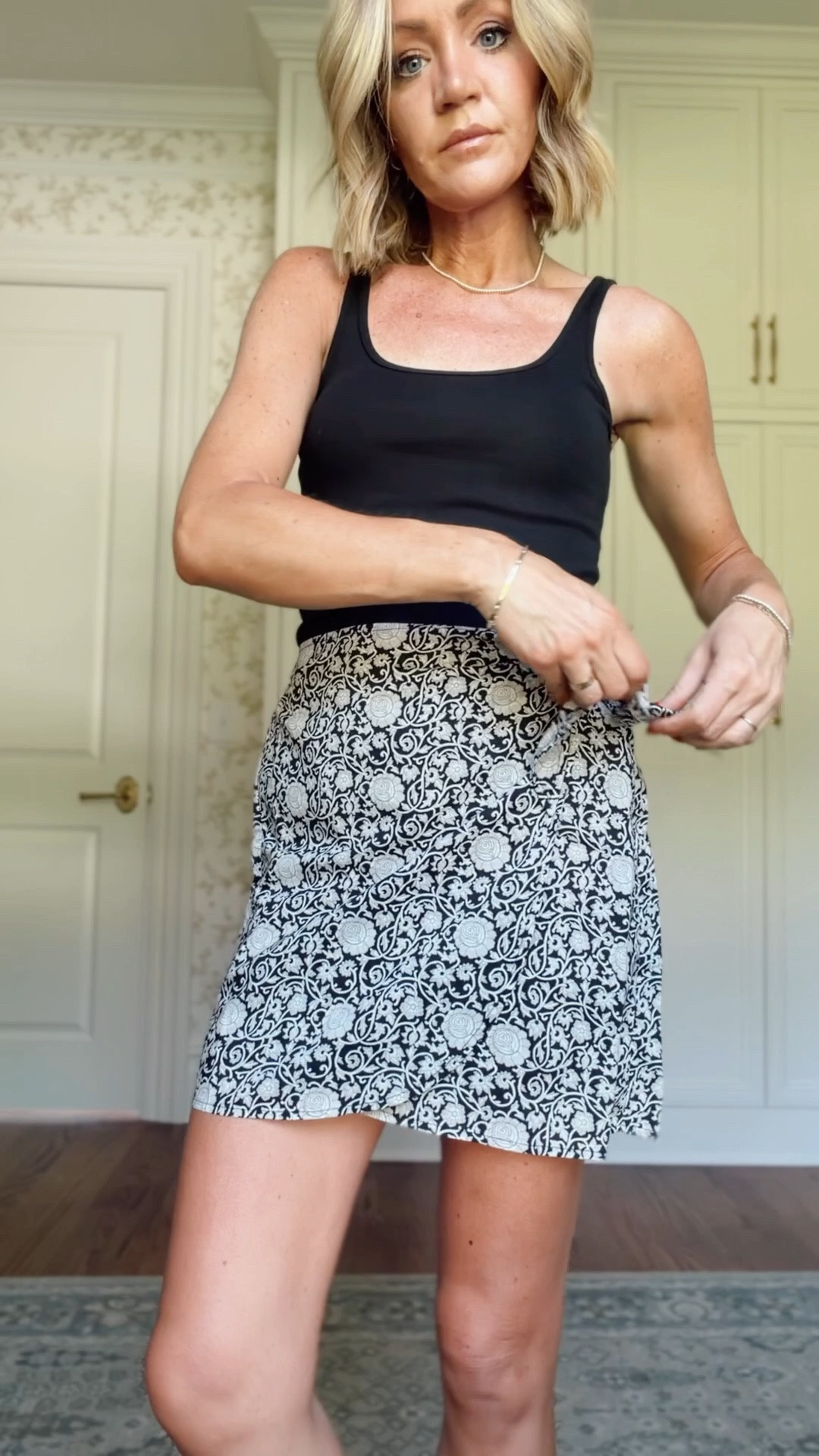 Xs in tops
S in skirt 
Xs in short skirts