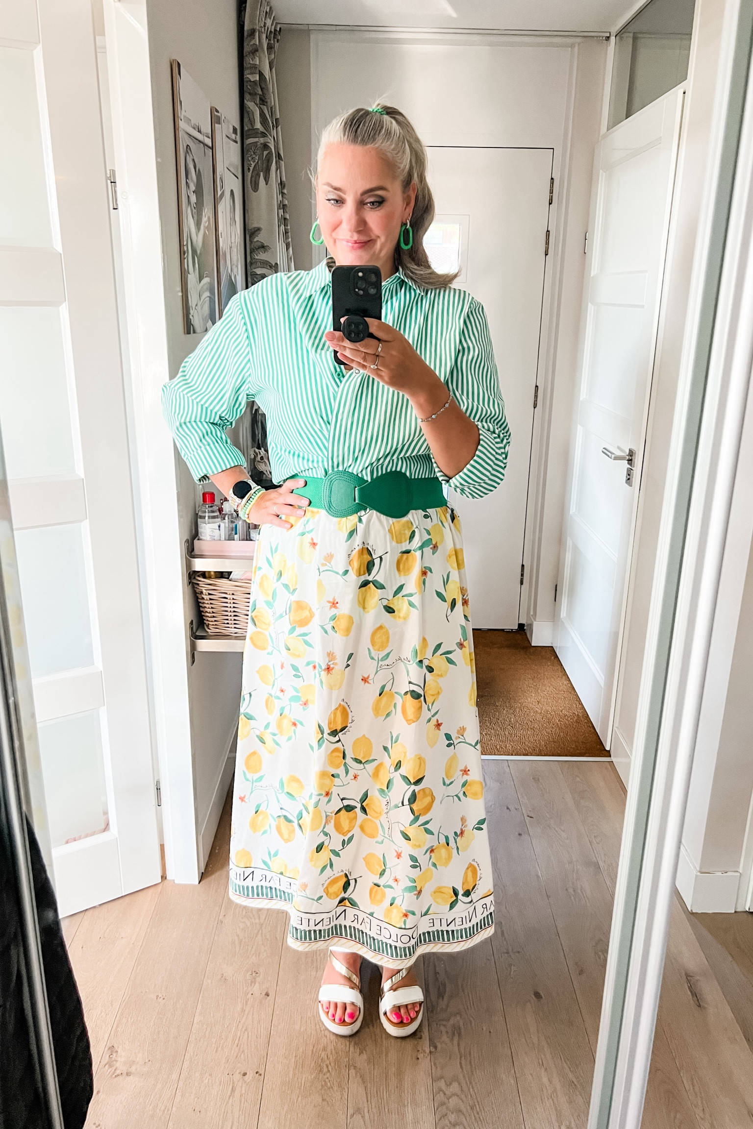 Ootd - Monday. Yellow ribbed tank top (hardly visible), green striped buttons down shirt (part of a set), green elastic belt and lemon print midi skirt. White sandals (old). 



#LTKeurope #LTKsummer #LTKnederlands
