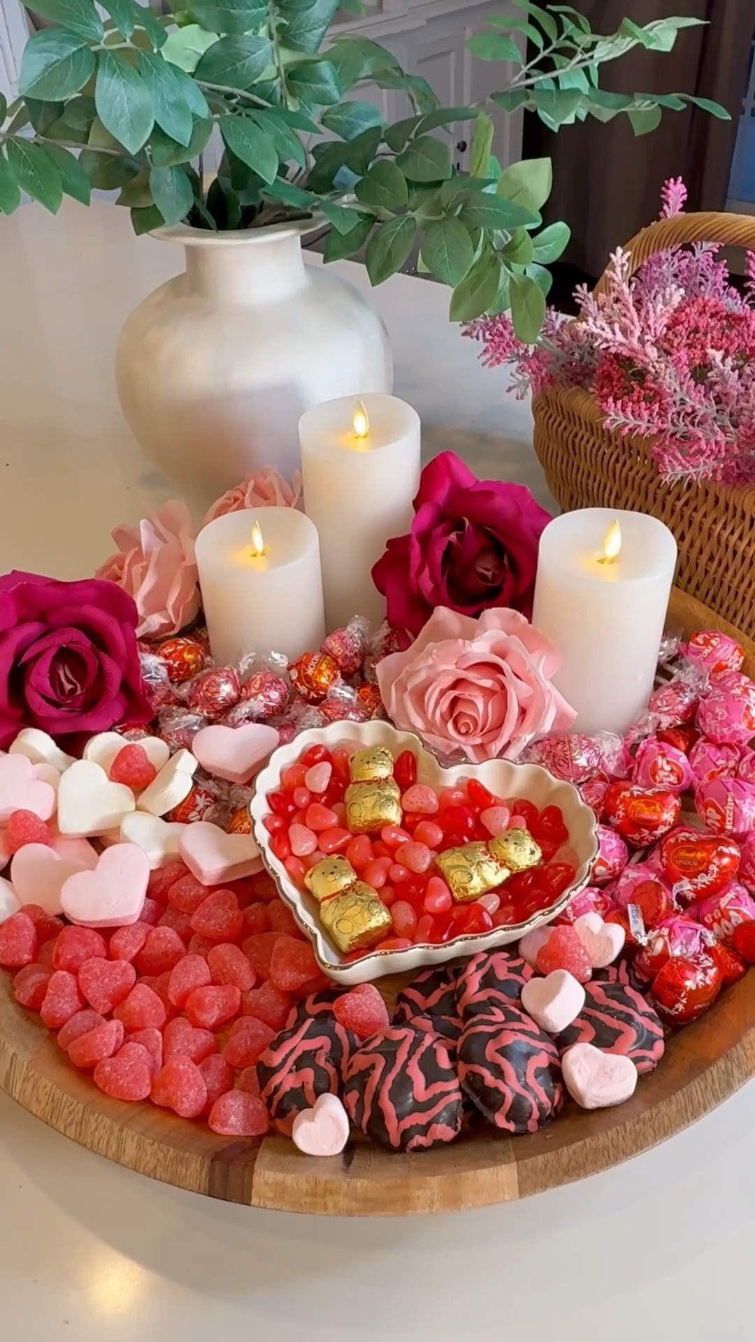 Candle + Candy Board ❤️ Elevate your Valentine’s celebration by layering flameless candles and faux roses on a tray, then fill it with a vibrant selection of candies and treats for a gorgeous and delicious dessert display! Perfect for your sweet loves, besties or a special gathering. 

Valentines Day 
Dessert Board
Entertaining


#LTKSeasonal #LTKFamily #LTKParties