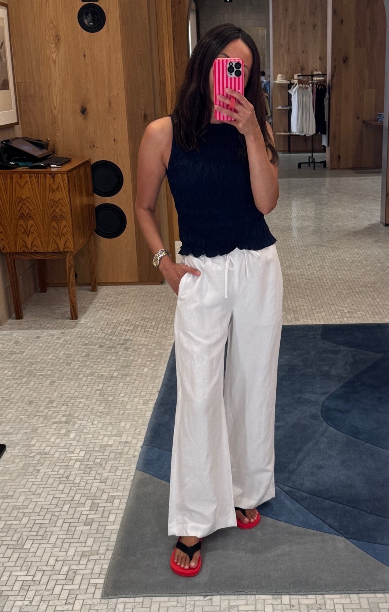 White pants. Linen pants. Summer pants outfit. Dressy casual outfit. Elevated casual outfit. Vacation outfit. 
Tank top with a gathered texture that is stretchy. All cotton. I sized up. Also available in pink and white (navy pictured here). Wide leg linen blend pants. Great cut and fit. True to size. 
Red flip flops.

#LTKootd #LTKOver40