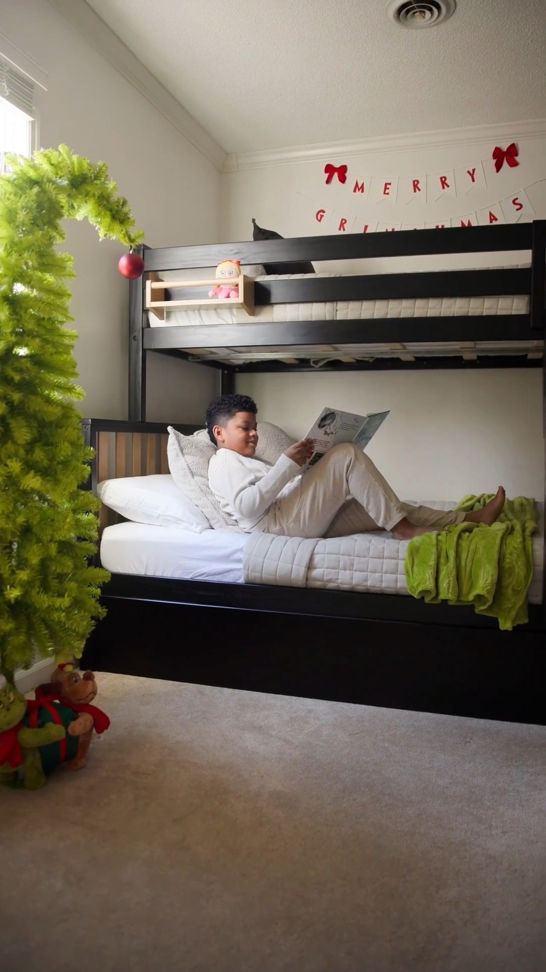 🎄Merry Grinchmas! I know it’s early but I couldn’t wait to surprise him with this stunning Scandinavian Twin Over Full Bunk Bed with Trundle from Max and Lily Furniture! It comes with comfy mattresses and a handy book rack. It’s his new favorite spot 🥰. #maxandlilypartner

#LTKHoliday #LTKHome #LTKKids