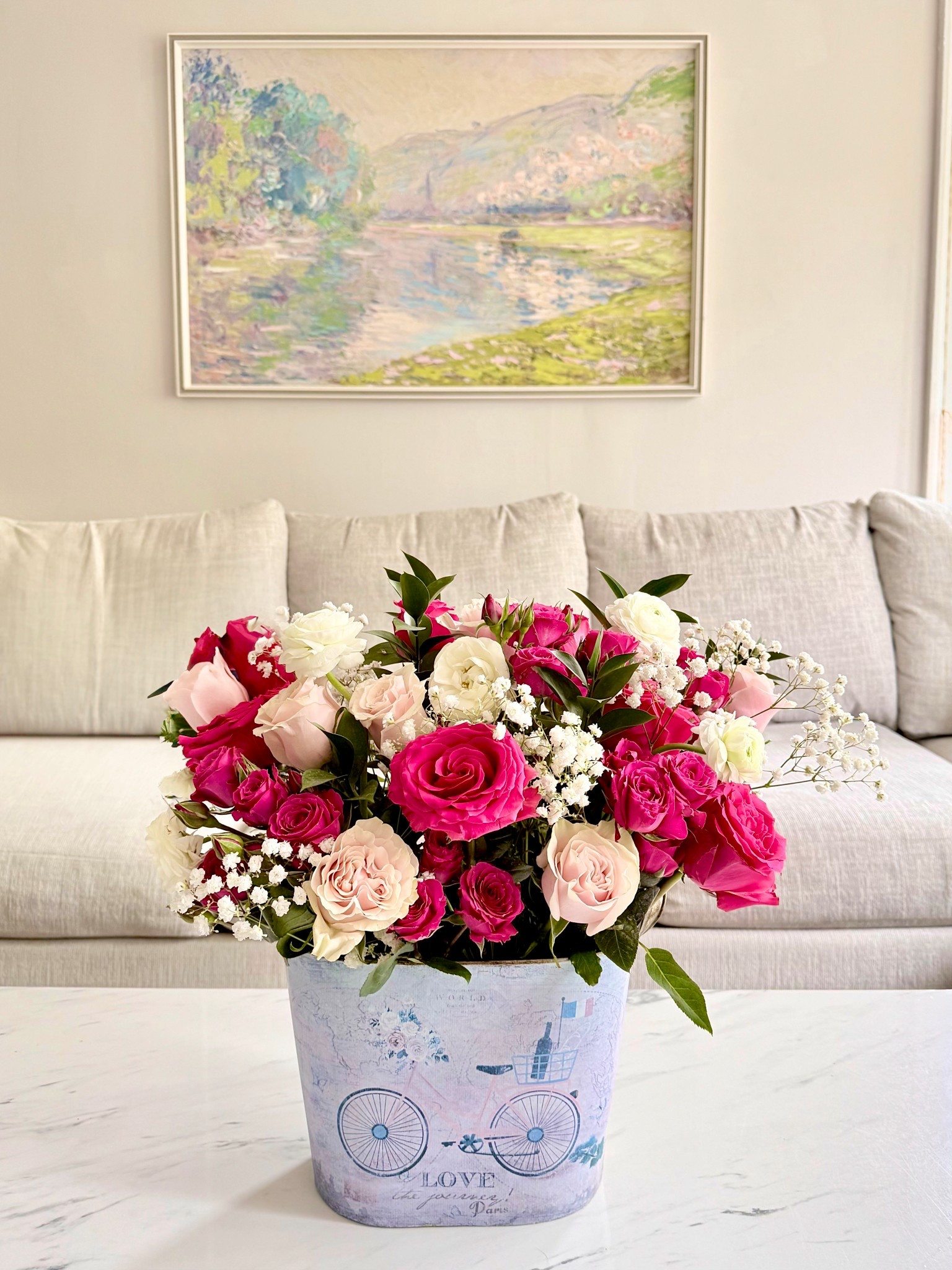 Love using decorative buckets or other items to make floral arrangements, especially for Valentine’s Day decor. Just put a vase with water inside and voila, you have yourself a unique diy vase! That Monet painting is one of my favorites and I love our beige couch. Romanticize your life every day :) 

#ltkunder100 #ltkunder50 #valentinesday #valentinesdaydecor #vase #couch #sofa #wallart #home #homedecor

#LTKValentine #LTKdayinmylife #LTKHome