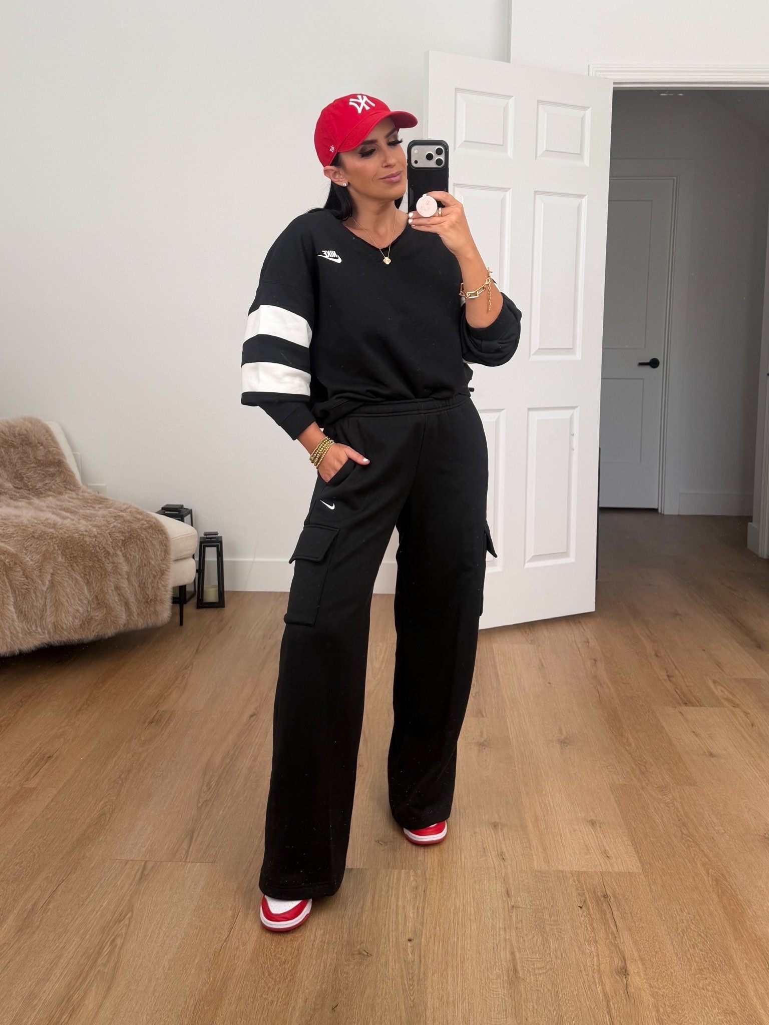 Woman’s Nike Sportswear Club Fleece. I’m wearing a size small.

Woman’s Nike Sportswear Phoenix Fleece cargo pants. I’m wearing a size small.
