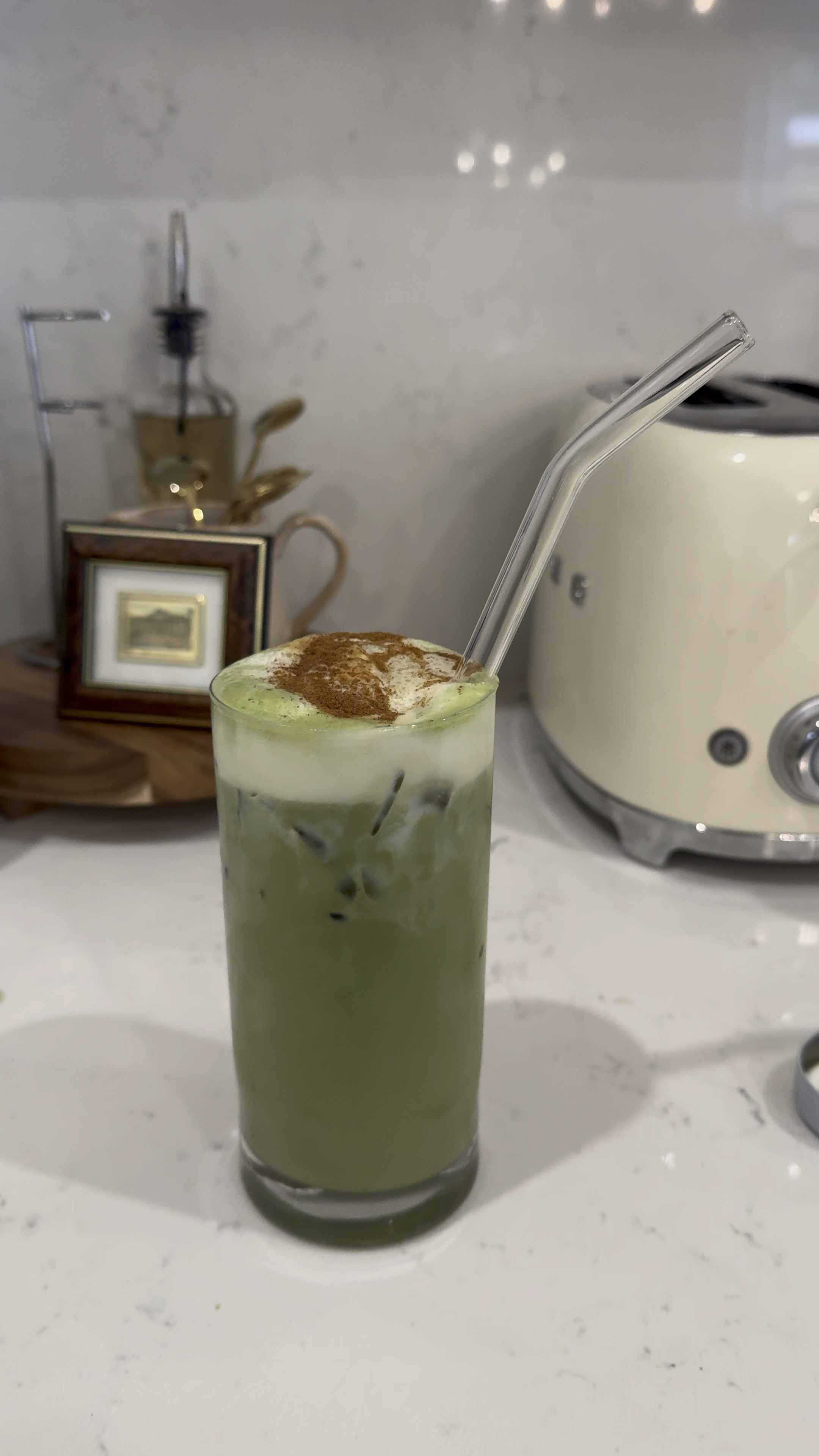 + Matcha (linked here!) 
+ Whole Milk 
+ Espresso Shot (Linked here!)
+ Sugar Free Vanilla 
+ Frothed Sweet Cream Creamer 
+ Sprinkle of Cinnamon  