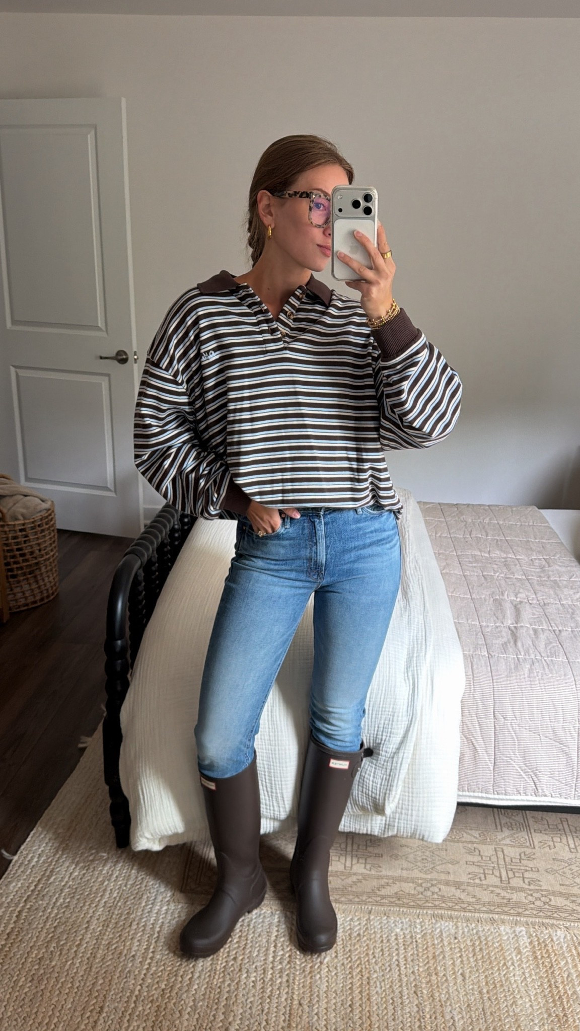 9/13/26 Gloomy September OOTD ☔️🤎

A gloomy September day called for the chocolate brown Hunter boots 🤎 Styled them with my Mother jeans + this striped Damson Madder long sleeve polo that I purposely bought super oversized — wearing a US 12 for reference.

Finished with my Amazon blue light glasses for an easy, cozy rainy-day outfit that finally feels a little like fall. ☔️🍂 Everything I can link is here!

#LTKootd #LTKSeasonal #LTKSaleAlert